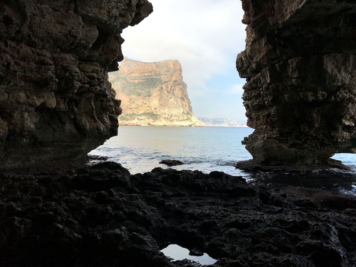 Sea cave looking out to the sheer cliffs of Javea’s southern coast near La Granadella