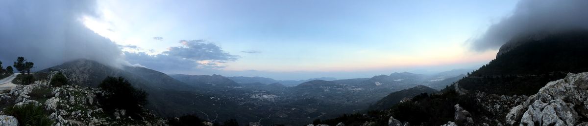 Dusk panorama over the Jalón valley from the hills above Parcent, vineyards fading into blue light