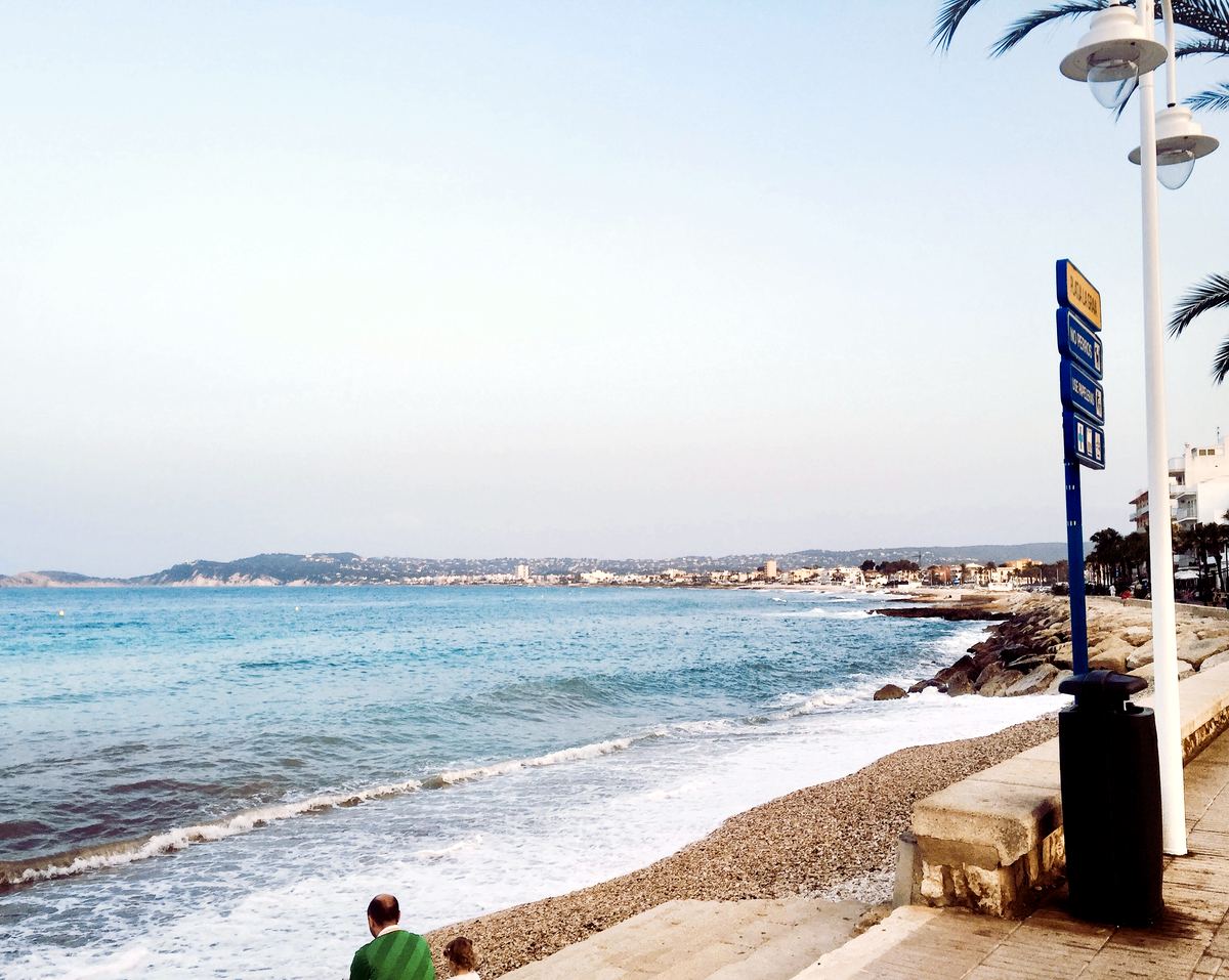 A brisk winter sea rolling onto La Grava’s pebbles by the port