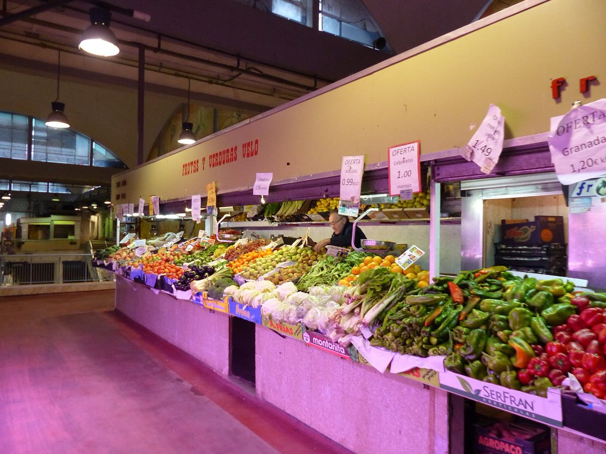 Fresh produce stacked on a Spanish market stall